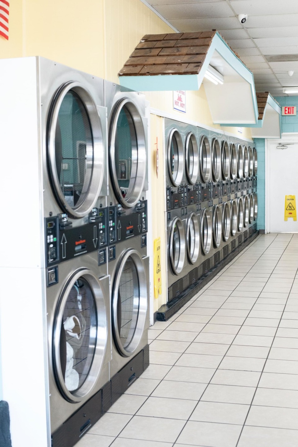 Aisle between stacked dryers