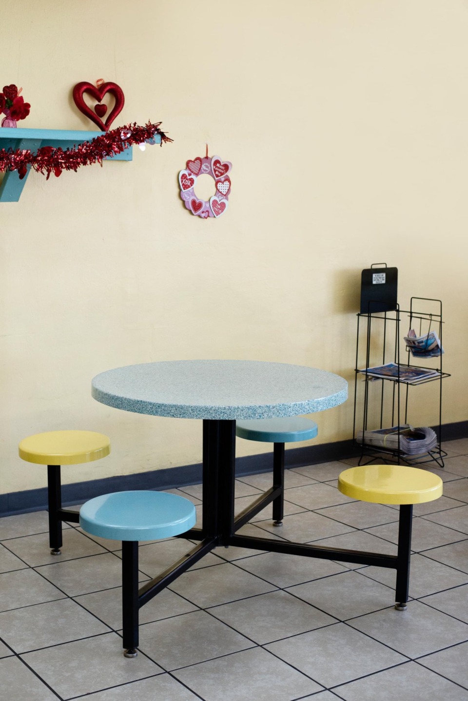Seating area with a table and stools