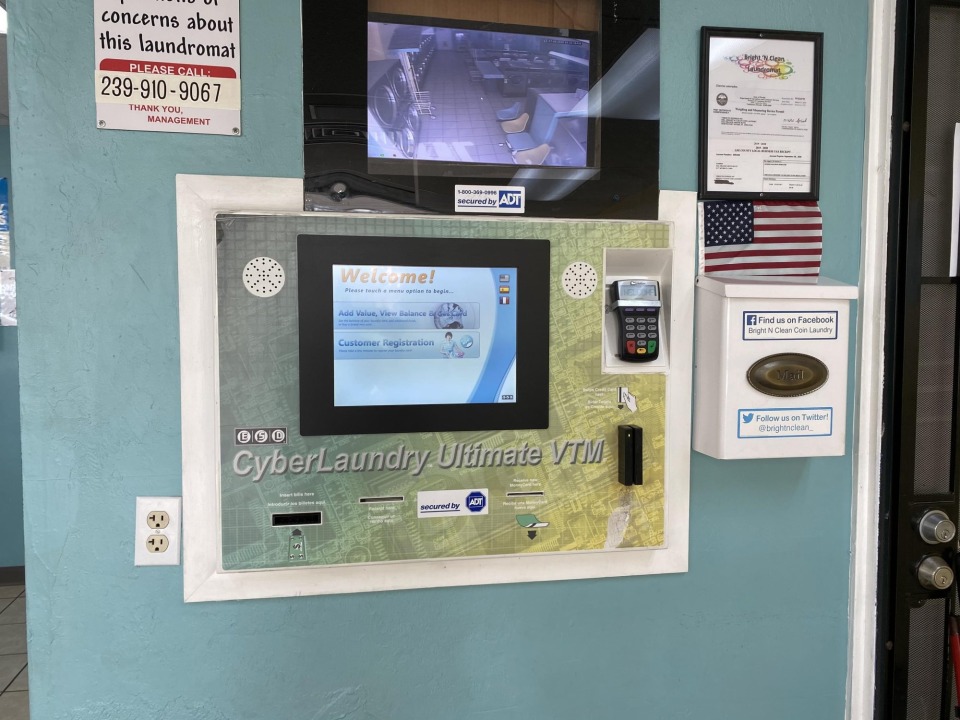 Card and cash payment kiosk for the re-loadable wash card