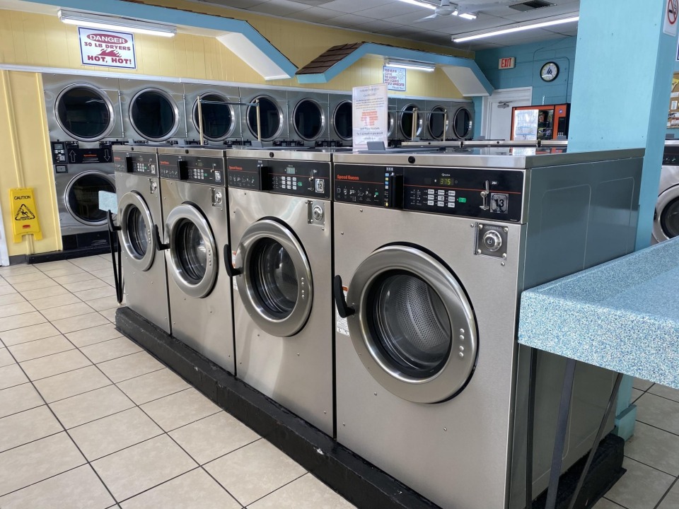 Row of washers under the wall-mounted TV