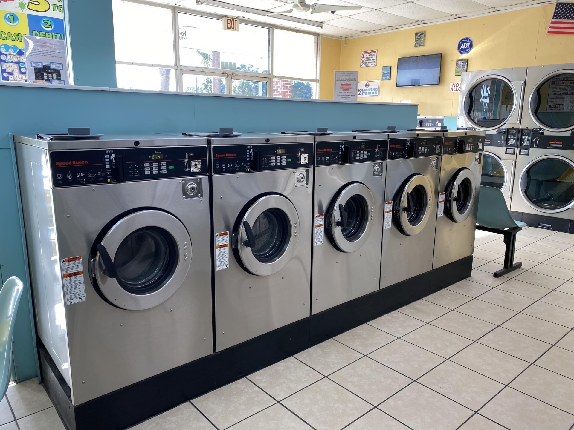 Row of washers by the front windows